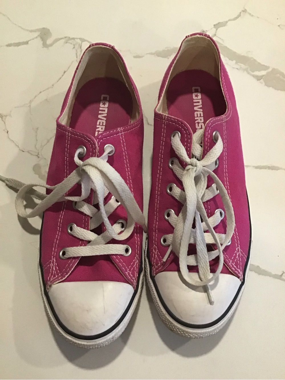 Converse women’s Low Top Sneakers in Bright Pink